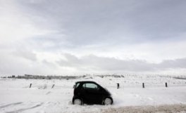 A vehicle trapped overnight by an ice storm sits abandoned on the Glenshane Pass in Northern Ireland