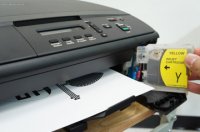 Silver nanoparticle ink is injected into an empty cartridge and used in conjunction with an off-the-shelf inkjet printer to enable ‘instant inkjet circuit’ prototyping. (Photo courtesy of Georgia Institute of Technology)